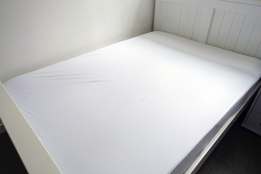 Nectar mattress protector on bed